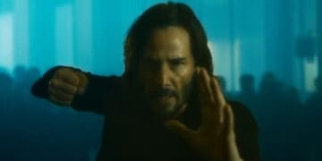 No, it's not John Wick. It's Neo, as Keanu Reeves returns in The Matrix Resurrections. (Images: Warner Bros. Pictures)