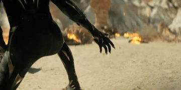 The gold trim of the Black Panther suit gives us a clue to the identity of the new superhero.